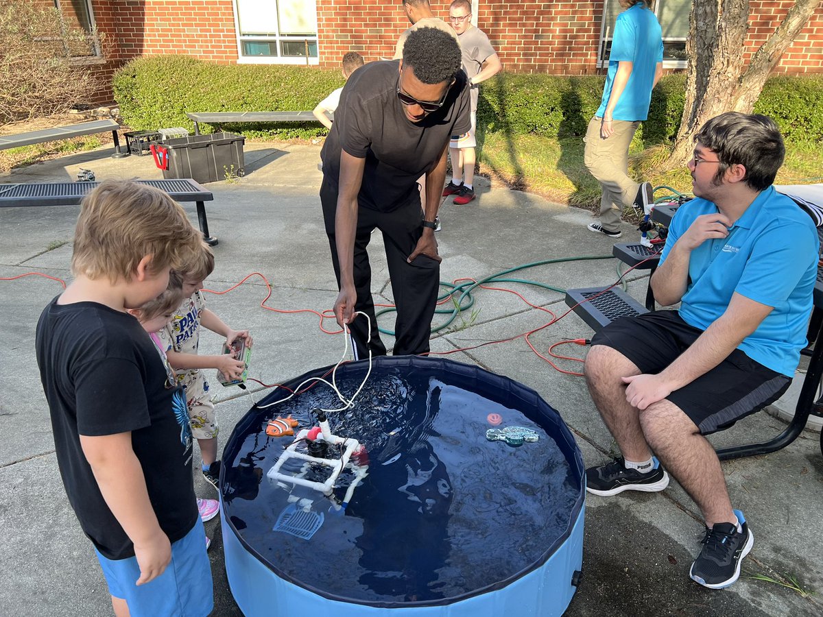 STEMAcademyLHS's tweet photo. Eric, Alex, Michael and Robert did some good work at Brookwood ES today for their STEM Night as they showcased Underwater Robotics. Great work @LandstownEagles ! #stemservice https://t.co/Gpbn7kk84r