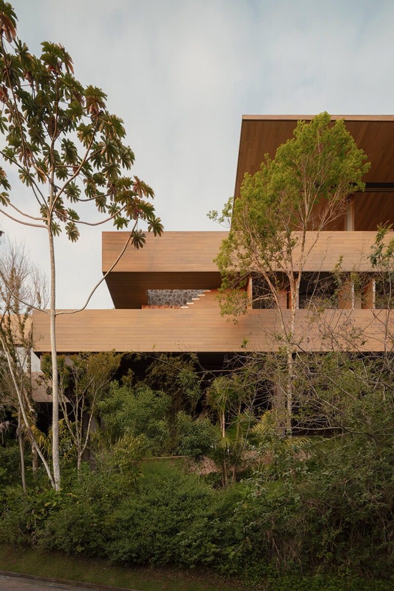 designboom's tweet image. arthur casas adapts speculative structure into wood-lined coastal house in #brazil designboom.com/architecture/a…