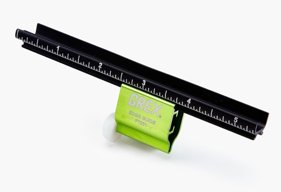 Our Edge Guide has a graduated arm (marked in 1/16" increments) that permanently mounts on the magazine, with a removable stop that can be locked at any point along the arm for accurate, repeatable positioning.