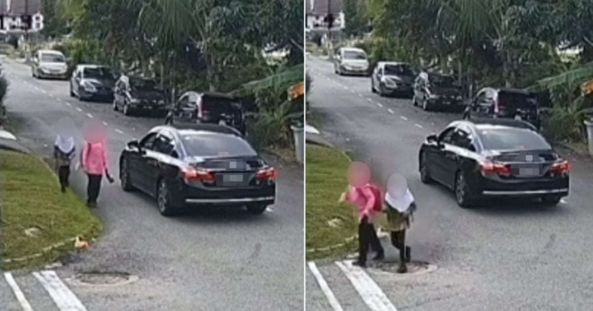 NST_Online's tweet photo. #NSTnation In the 1pm incident, a closed-circuit television recording installed at a house in the housing area captured a black car idling along Jalan Padi Mahsuri 10 as two girls walked past.

https://t.co/OvlJ6hEiQ4 https://t.co/BrHM660sbW