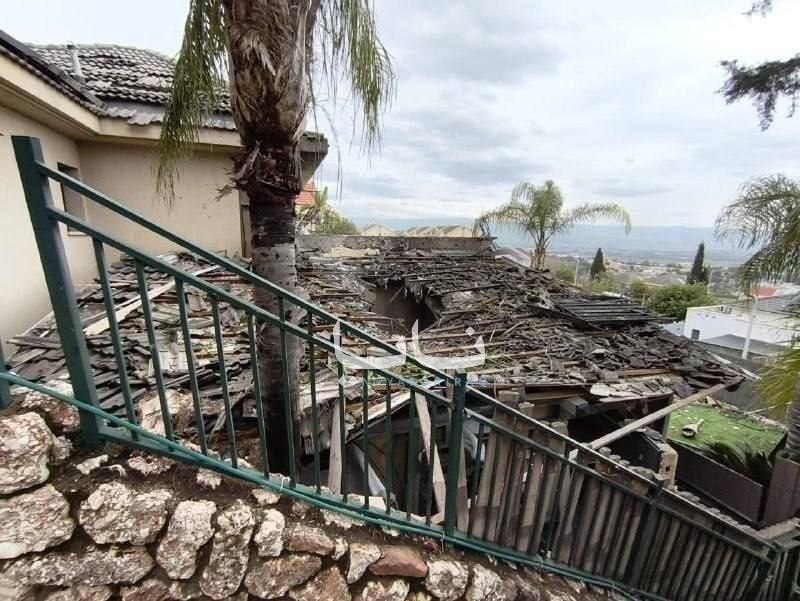 PressTV's tweet image. Hezbollah rockets landed directly in the Upper Galilee without triggering air-raid sirens, injuring two people in Kiryat Shmona after launches from Lebanon.