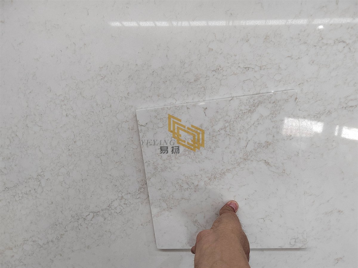 If you're looking for a warm white quartz with whisper veining, you're bound to fall in love with this quartz design. This sleek, casually sophisticated style features a solid white background with contrasting flecks.
#quartzcountertop #quartzslab #quartzsurface
