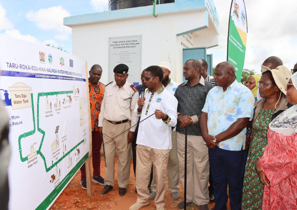 NDMA_Kenya's tweet photo. Kwale Governor H.E. Fatuma Achani today officially commissioned the Taru-Roka-Egu-Kwa Kalinga Water Pipeline Extension Project in Mackinnon Road Ward, Samburu-Kwale Sub-County.
The Governor was accompanied by Deputy Governor Hon. Chirema Kombo, NDMA Board Chairman Mr. Shallow Yahya, CEO Lt. Col. (Rtd) Hared Adan, NDMA Board Members Ms. Leah Sambai and Mr. Ahmed Bishar, Deputy Government Spokesperson Ms. Mwanaisha Chizuga, County Executive Committee Members, and National Government Administration Officers.
Implemented by NDMA with funding from the European Union @EUinKenya  and in collaboration with the @OurKwaleCounty, the KSh 24 million project provides reliable water services to communities in five villages in Taru Location, including Taru, Roka, Egu, and Kwa Kalinga. The project is directly benefiting more than 3,300 people and over 5,000 livestock.
Governor Achani described the project as a major milestone in strengthening water security and safeguarding livelihoods in Mackinnon Road Ward. She commended the collaboration between both levels of Government, noting that the intervention has significantly eased the burden of water access on families, particularly women and children, while also supporting livestock-based livelihoods that are central to the local economy.
The project was prioritised following a Participatory Disaster Risk Assessment conducted in 2023, which identified chronic water insecurity as the highest-ranked drought risk requiring urgent intervention.
Key project components include a 7.7-kilometre high-density pipeline, a 60,000-litre underground ferrocement storage tank, a solar-powered pumping system, three water kiosks, four communal water points, four cattle troughs, two motorcycles for routine operation and maintenance, and system maintenance equipment.
Deputy Government Spokesperson Ms. Mwanaisha Chizuga commended NDMA for ensuring that national government projects continue to deliver tangible benefits to citizens at the local level.