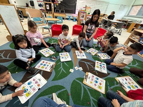 WashingtonD50's tweet photo. Ms. Luna's class sharpened up their shape identification skills during a few fun rounds of Shape BINGO. 🟪🔵🔺💛 #BINGO #Shapes #LearningThroughPlay #TheWashingtonWay https://t.co/caeyIxGls0