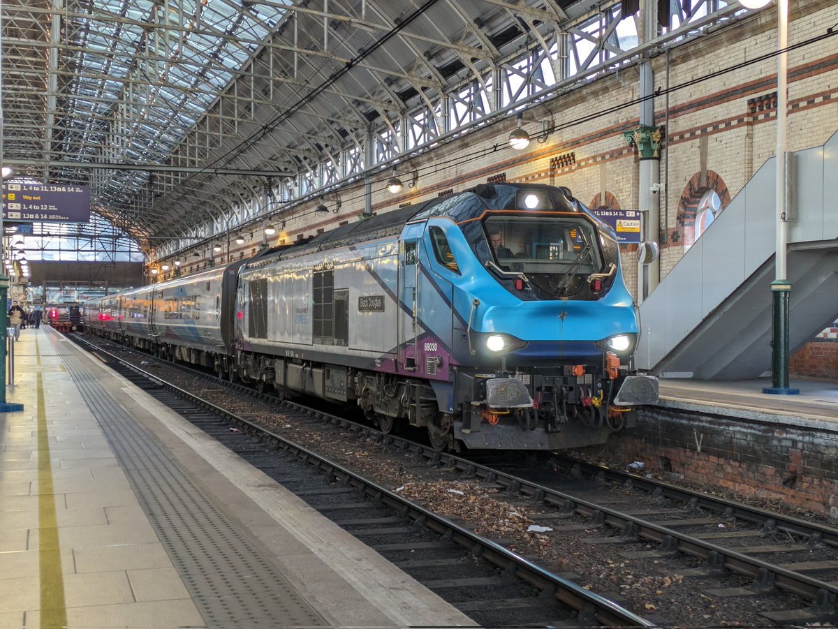SteelCityDog_'s tweet photo. 68030 "Black Douglas" is lights on and ready to go with a TranspennineExpress service across to York and Scarborough on the 30th of November 2023.
Annoyingly I've been incapacitated by a muscle spasm in my lower back, so its archive posting for now! #Class68 https://t.co/bq375k0tym
