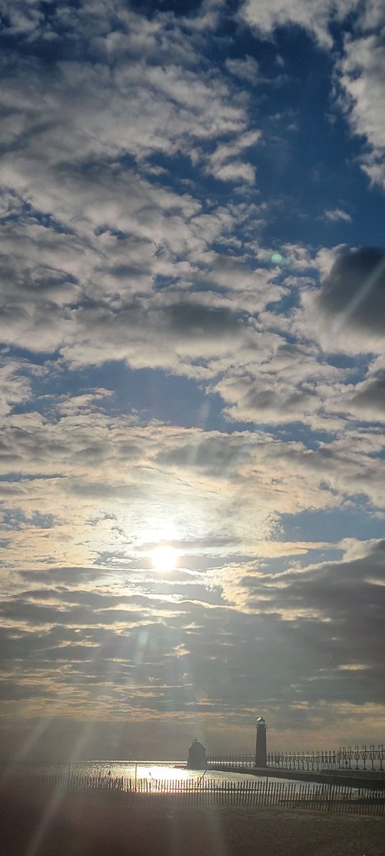 DogDays77's tweet photo. Psalm 57:10 "For your steadfast love is great to the heavens, your faithfulness to the clouds." I mean, come on. This shows it all❤️. The Lord's canvas is beautiful #Clouds #GrandHaven #HeIsFaithful #Beautiful #CantGetEnough #SingHisPraises https://t.co/Jabk9vP2fe