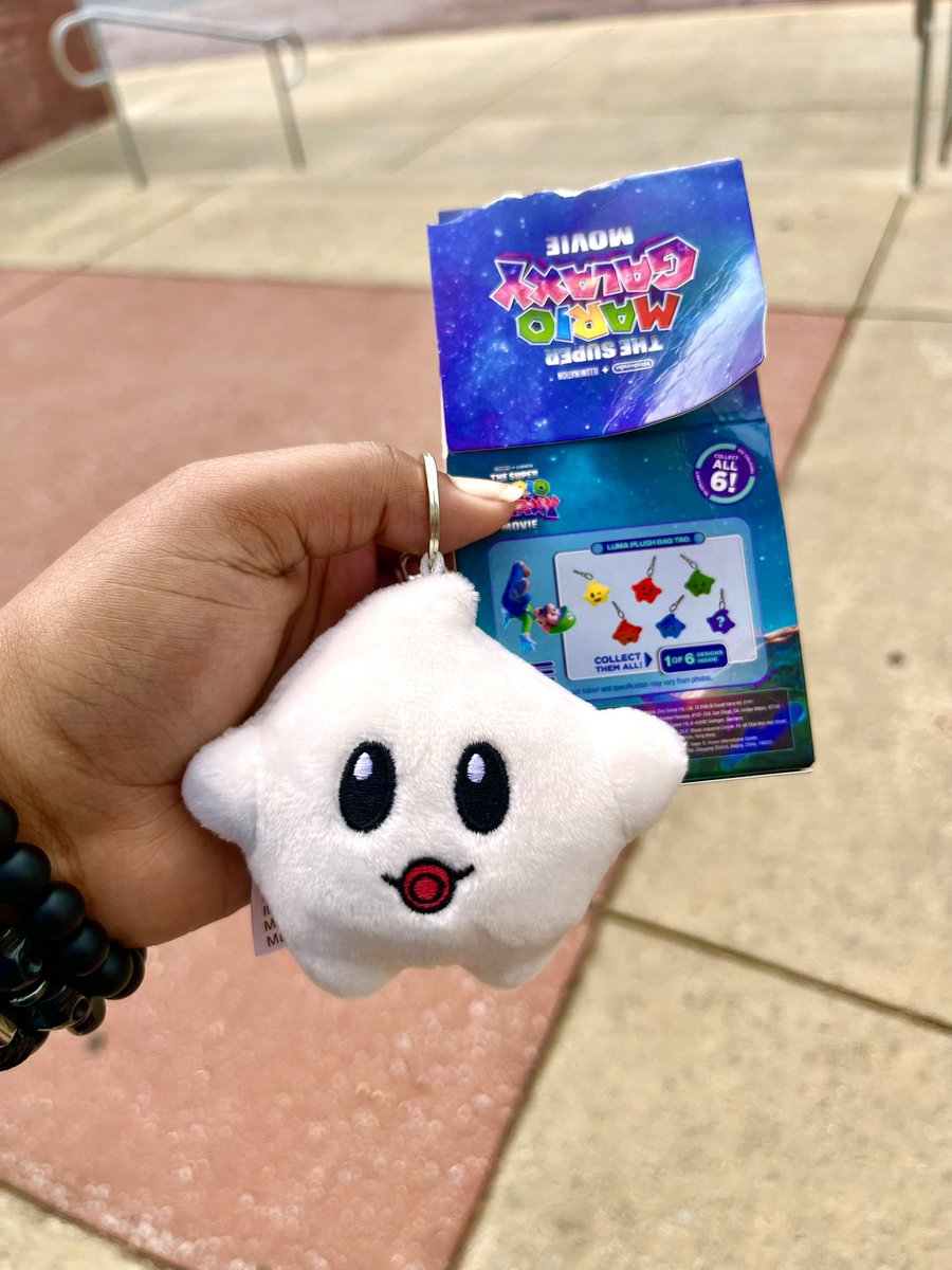 Mario movie was ass but I got the white star key chain!