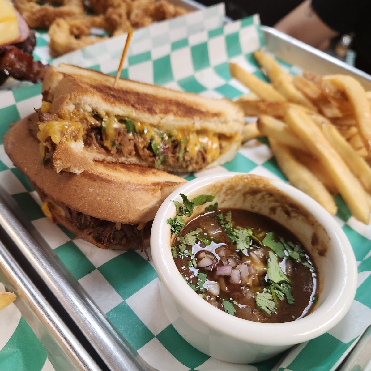 It's a Hawk's Nest favorite! 💚 Our Birria Grilled Cheese is packed with tender birria beef, melty mexican cheese blend, chipotle aioli, onion and fresh cilantro, all toasted to perfection on Texas Toast!