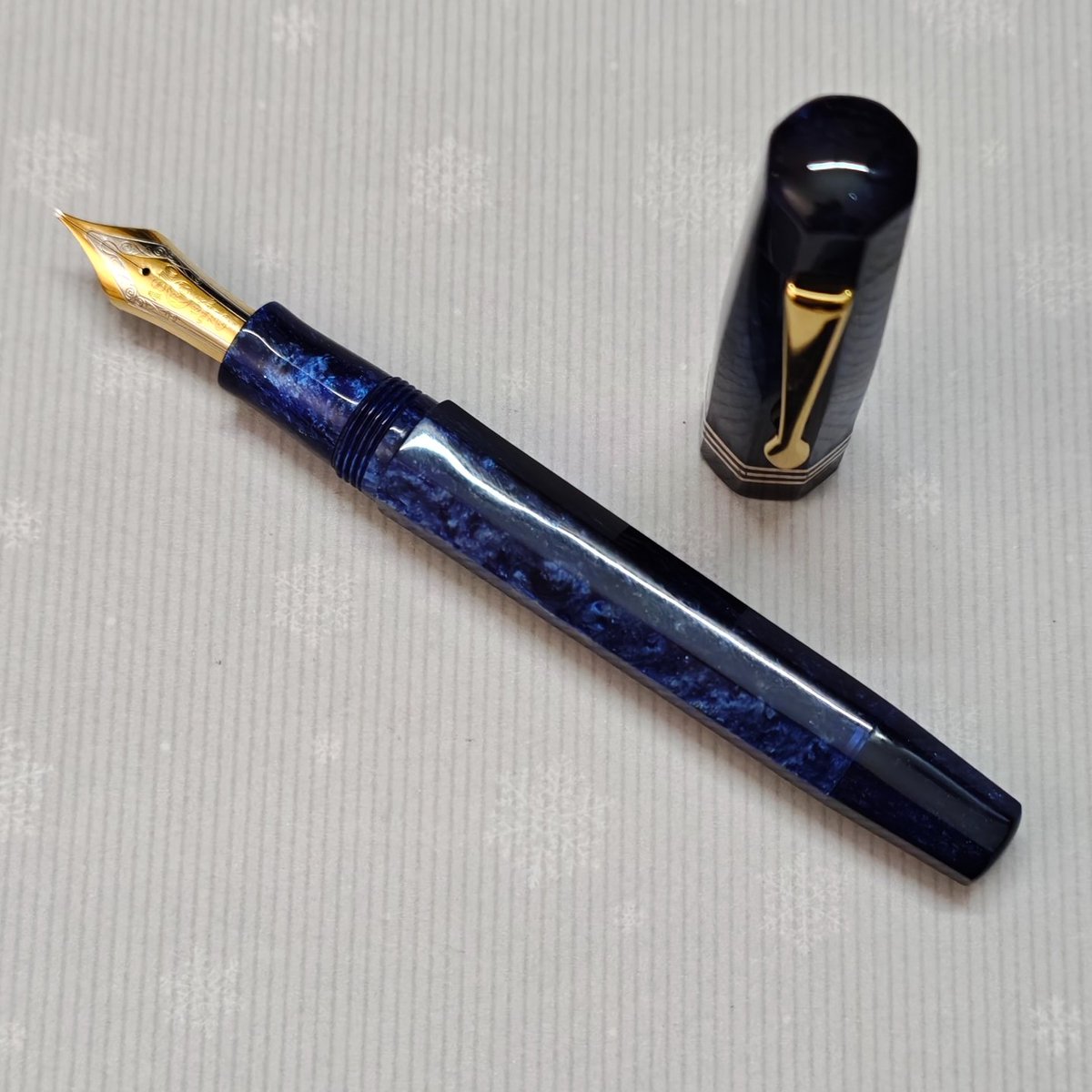 FosforPens's tweet photo. Just finished: Ashtakone pen in Conway Stewart Blue Stardust. It hold a Montblanc 149 nib unit and has a built-in piston filler. https://t.co/pdM7JjkqtB