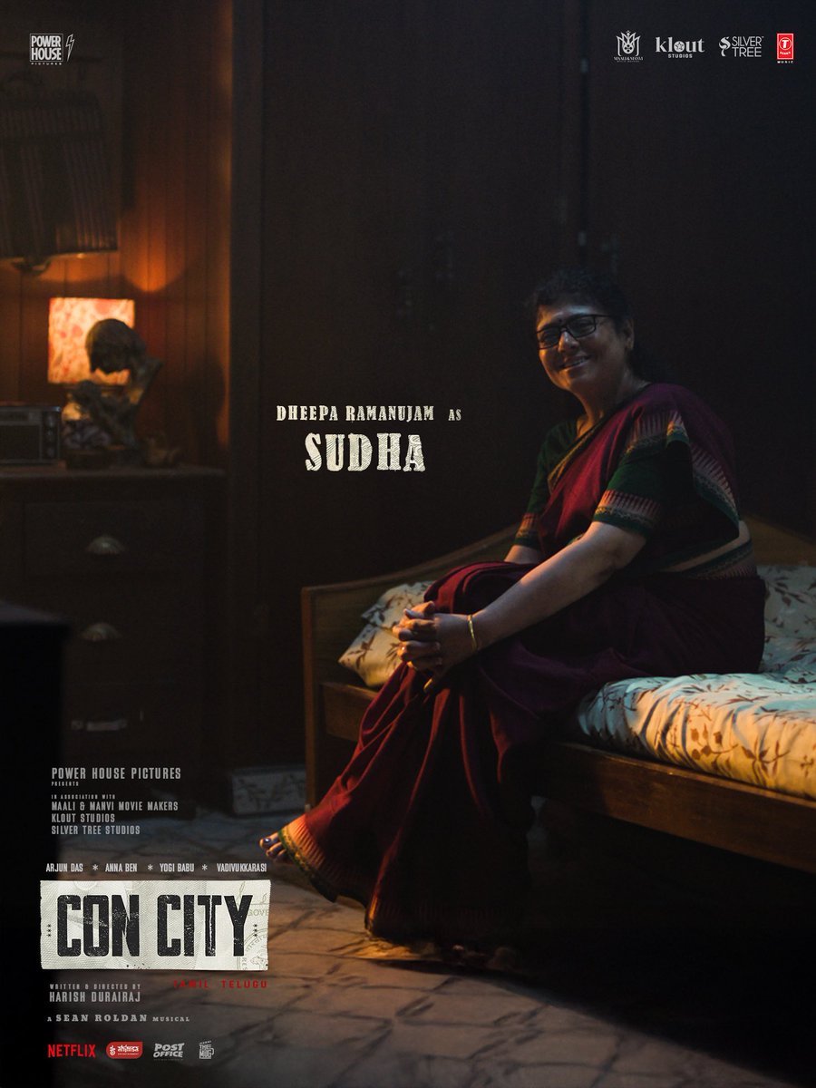 powerhousepic's tweet photo. Her entry calls for more merry!

@dramanujam as Sudha, in the world of #ConCity.

A film by @harish_durairaj, coming soon to theatres.

Starring @iam_arjundas @benanna_love @iYogiBabu #Vadivukkarasi #Akhilan. 

@powerhousepic in association with @Maaliandmaanvi @kloutstudios and
@SilverTreeOffl

A @RSeanRoldan musical

@arunprajeethm @vijaymp29 @proyuvraaj @Netflix_INSouth @TSeries @tseriessouth @vithurs_ @ahimsafilms @sidhuwrites