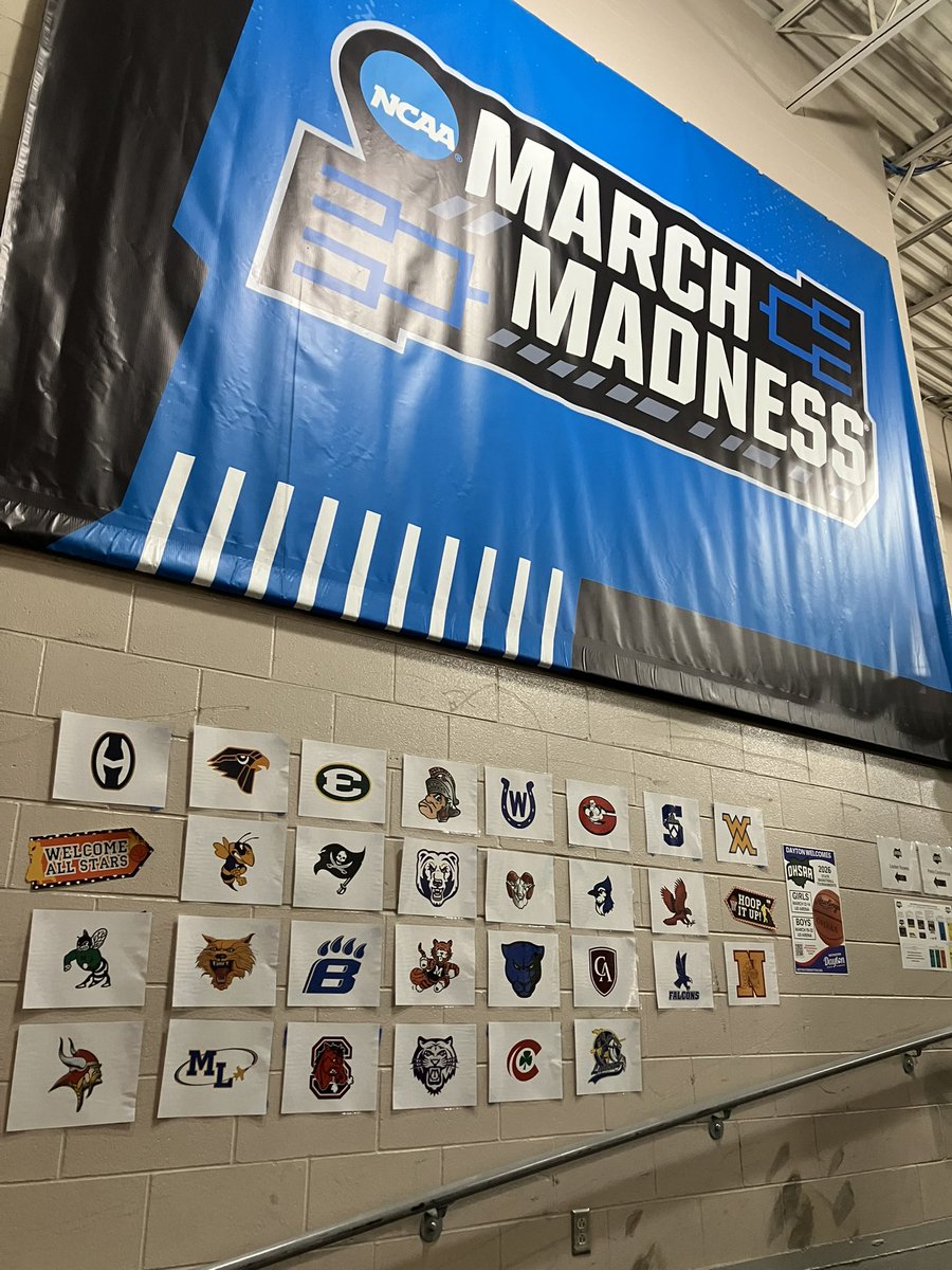 mgoul's tweet photo. A look at the wall on the hallway down to UD Arena on the last day of the season and all the teams that made the final four in their respective divisions. https://t.co/grDvLUxySW