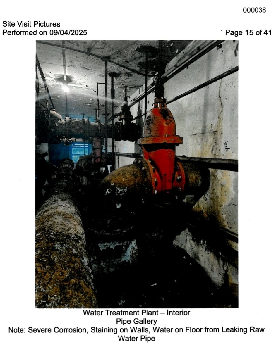 HollerGospel's tweet photo. These are the WV Public Service Commission's pictures of the City of Gary's water system. Their municipal water source is at the foot of a coal refuse impoundment. 2-4" of coal refuse lies in the well house. Their public water source is a permitted active mine site. #waterforwv https://t.co/3iLth9X0Dq