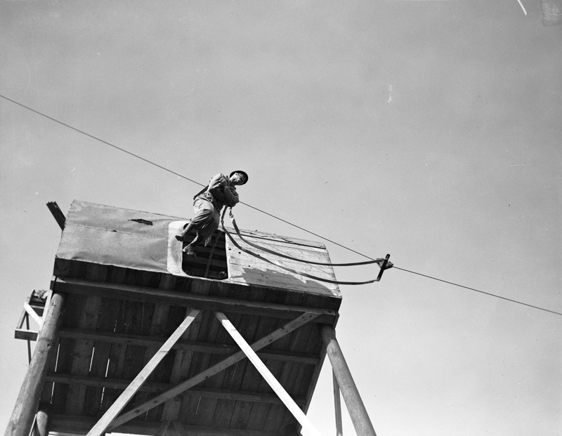 You can also begin to understand that the focus of the various obstacles and exercises was to make paratroopers. From the ramps that you ran up and jumped off, to the jumping platform, to the 50-foot cargo net tower and the 34-foot jump tower and mocked-up aircraft fuselage... /3