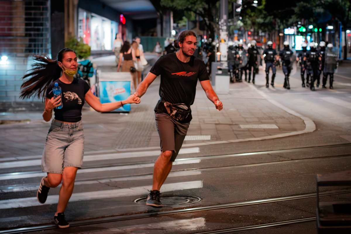 Hello, I am Iva. I was depressed and jobless since the beginning of the pandemic, sometimes photographing bands and small conferences for less than I needed to pay my bills. As I started photographing protests and riots my photographs got famous and after we got a last note