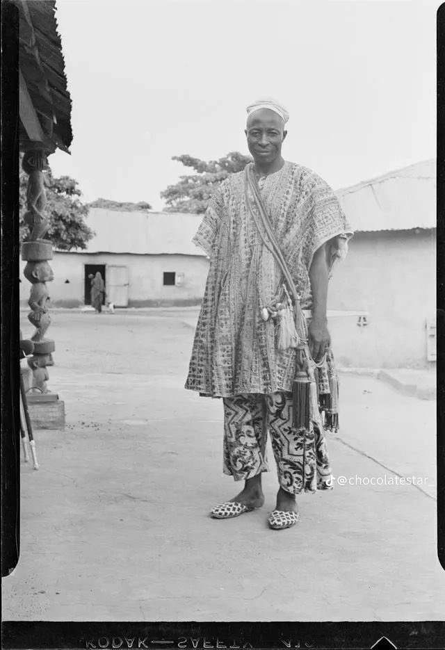 Palace official with a Takuba sword by his side.
Early 20th century
Yoruba Land,Nigeria