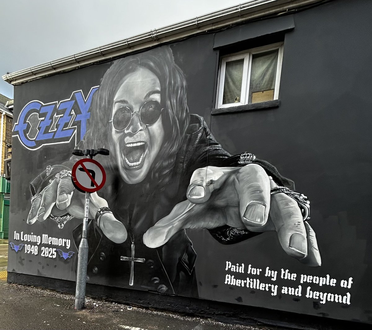 s_vaults's tweet photo. @OzzyOsbourne @TheOzzFest @Mr_Murals Our memorial mural that was paid for by the community of Abertillery and beyond. Art by #wallsbypaul We miss you Ozzy. ❤️ https://t.co/R0oI04cpr7