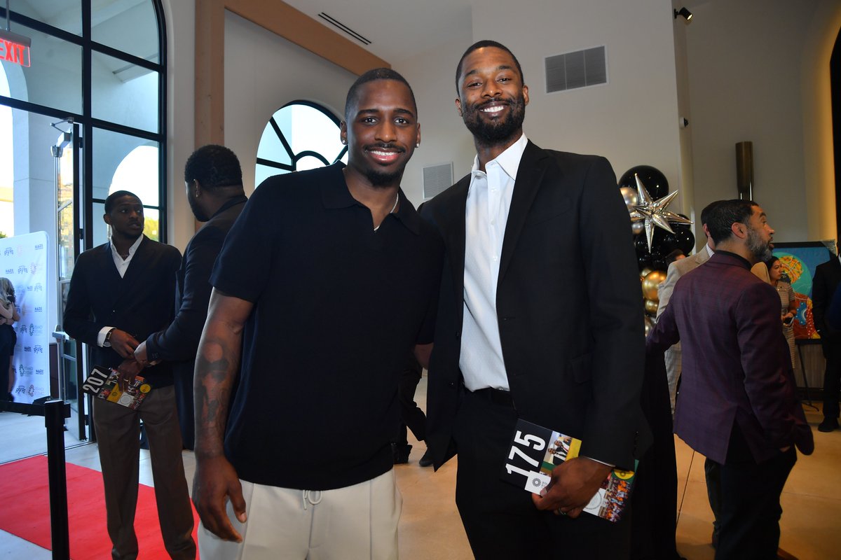 spurs's tweet photo. Supporting each other on and off the court 🤝

@bismackbiyombo hosted his Changing Lives, Building Futures Gala benefitting the Bismack Biyombo Foundation’s education and youth-focused initiatives this weekend and the squad pulled up to show love 🤍🖤 https://t.co/vOKg9cfqHV