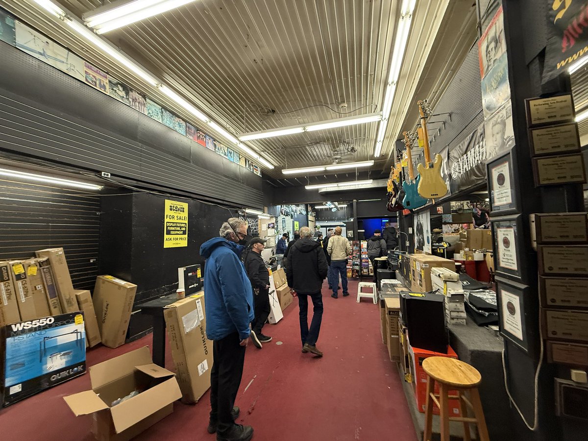 JohnWrightLive's tweet photo. @JoshMatlow @ambermac They have been my go-to since 1978. At the end of the day (and literally thousand’s spent on bass’ and amps), it’s all about the people who worked there and made it a place to learn and be our own rock stars…I bought the sign on the wall as my souvenir. Thanks for everything. https://t.co/qvcLVUFbOt