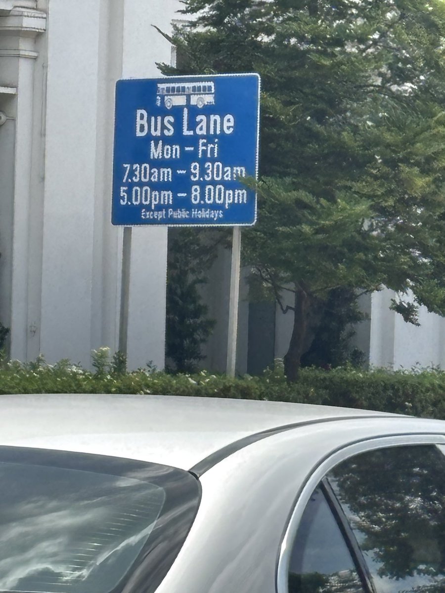 JsivaUrbantranz's tweet photo. Recently, during my  visit to #Singapore, I had the opportunity to observe how bus lanes are implemented on the ground.

Bus lanes as a concept are not new to us — cities like #Bengaluru and #chennai  have already tried them. But what stood out here was not the idea, but how consistently it has been implemented and strengthened over time.

Singapore introduced bus lanes as early as 1974, when the city was dealing with increasing congestion and declining bus reliability. The intent was clear — prioritise buses so that public transport remains dependable. What is interesting is how that idea has evolved into a much more refined system today. @LTAsg 

One simple but effective aspect is that the bus lane is not enforced throughout the day. It operates only during peak hours — morning and evening — and this is clearly communicated through signage on the road. It immediately builds acceptance, because users understand that priority is given only when it is needed most.

What also stood out was how well the system is communicated.

It is not just about a signboard.
The information is layered:
•Clear roadside signage with exact timings
•Consistent lane markings
•And even real-time alerts inside vehicles through onboard units, indicating when a bus lane is in operation

There is very little ambiguity for the user.

But in my view, the biggest reason why this works is something more fundamental.

The #kerbside is tightly managed.

In many of our cities, the leftmost lane is where everything happens — parking, loading, informal stops. So when we try to introduce a bus lane in the same space, conflict is inevitable.

In #Singapore, that conflict is largely addressed through strict control over #parking and stopping along bus lane corridors, especially during operational hours. The curb is largely kept clear, with designated spaces and strong enforcement.

As a result, buses move uninterrupted, enforcement becomes easier, and compliance becomes more natural.

It’s a reminder that a bus lane is not just a lane marking. It is a combination of parking management, enforcement, communication, and timing strategy.

We often ask why similar interventions struggle in our cities. Maybe the answer lies not in the idea, but in the ecosystem we build around it.

Worth reflecting as we continue to push for bus priority systems in Indian cities.
@BMTC_BENGALURU @MtcChennai @DKShivakumar
