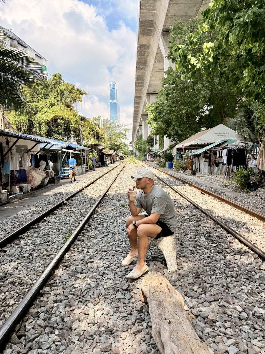 Coffee by the rails—unexpectedly calm, quietly liberating. Loved that i found this in Bangkok!