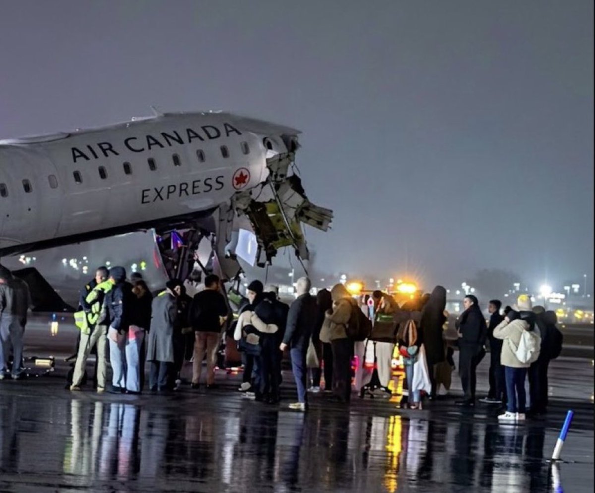 BreakingAvian's tweet photo. PHOTO: Major damage seen on front of Air Canada plane following collision with fire truck at LaGuardia Airport in New York. Multiple injuries, fatalities reported. https://t.co/tQEXOm4hzJ