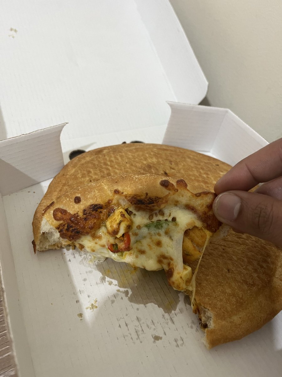 bimmeroconnor's tweet photo. You’re hungry and you order a pizza from @JustEatUK and this is what they deliver. I think it’s my mistake because they completely disown. Also, the cheese literally feels like a glue and every other thing about this order is ❌ https://t.co/XtWpvpNYQ6