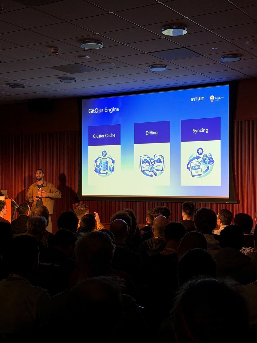 argoproj's tweet photo. Ever wondered what actually happens when you hit "sync" in Argo CD? 🔍
Alexandre Gaudreault is live right now walking through the anatomy of the GitOps Engine — step by step, from sync request to final "Synced" status.
"Anatomy of a GitOps Engine" — happening now at #ArgoCon #KubeConEU in G102-103. #GitOps #ArgoCD #Kubernetes #CloudNative
