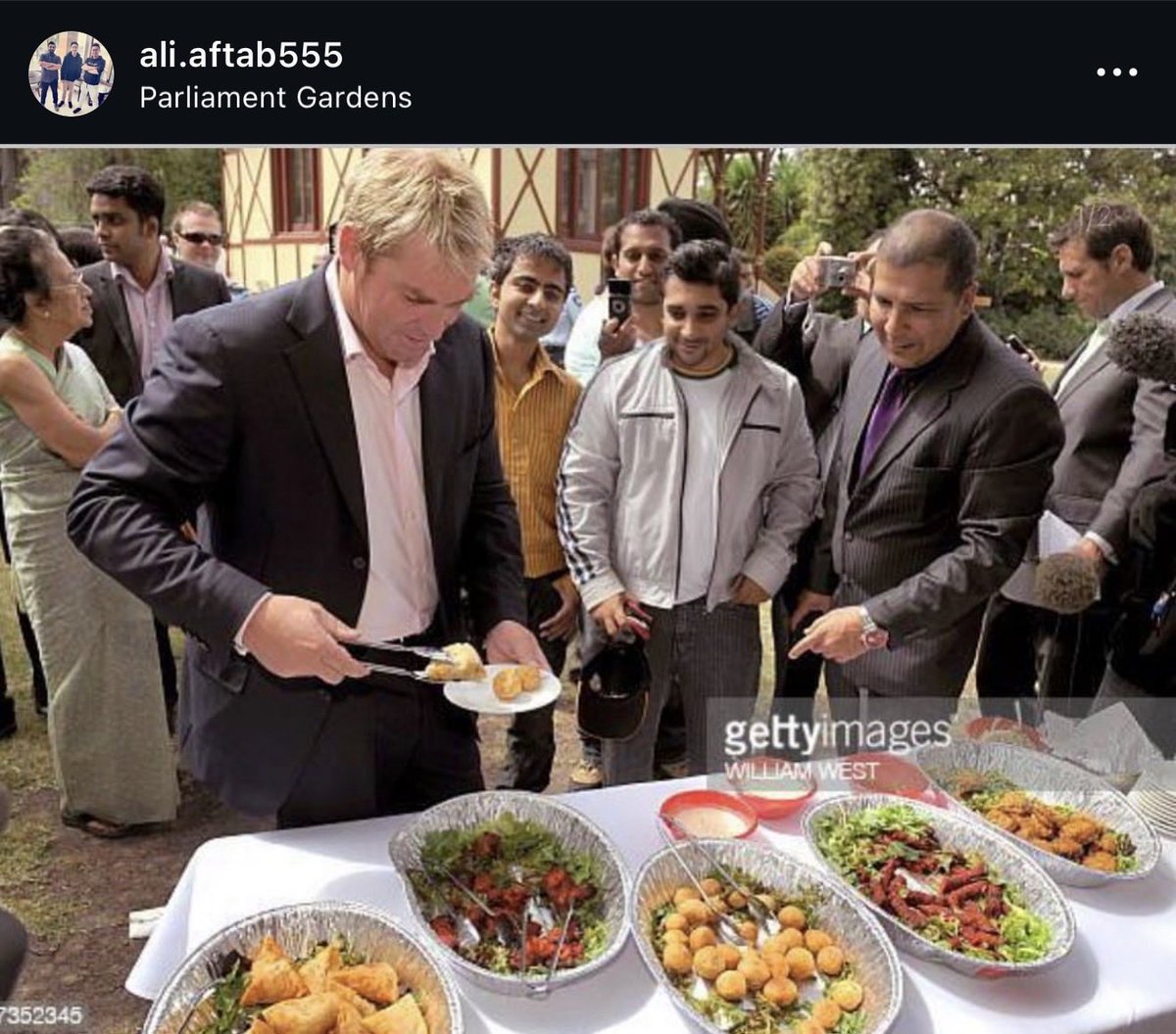 aliaftab44's tweet photo. Late Shane Warne with us trying some samosas 

@ShaneWarne @cricketcomau @CricketAus https://t.co/UZpjNghYRk
