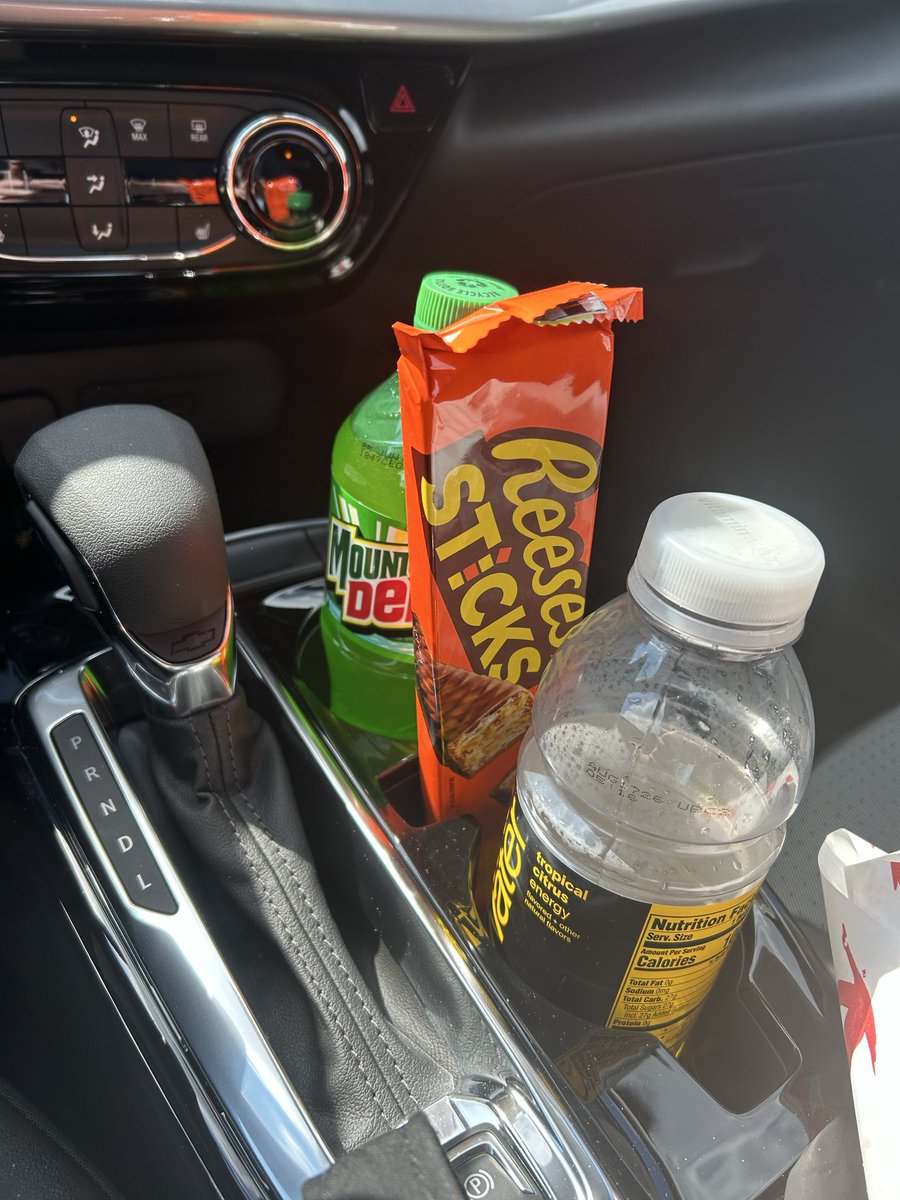 Apparently the cellphone slot in my new center console is also the perfect size for <a href="/reeses/">REESE'S</a> sticks. #TheMoreYouKnow
