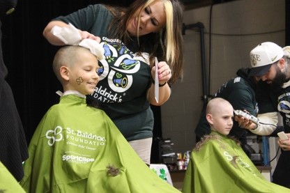 SPOPoru's tweet photo. Aiken students &amp; staff raised more than $20,000 for @StBaldricks Foundation whose mission it is to raise awareness about the impacts of childhood cancer. 31 students, staff &amp; community members had their heads shaved during the fundraising event.  Great Job!  #KOproud #AikenROCKS https://t.co/Mm5cwRKkhd
