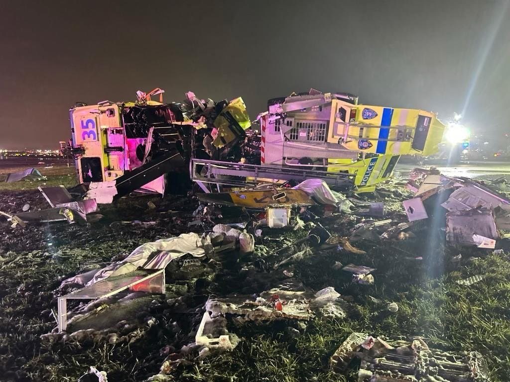 petemuntean's tweet image. NEW IMAGES obtained by CNN show the force of last night’s collision between an Air Canada regional jet and a LaGuardia airport fire truck.

The truck is on its side, barely recognizable. A Taxiway D sign, the route the truck used to cross Runway 4, is tangled in the wreckage.