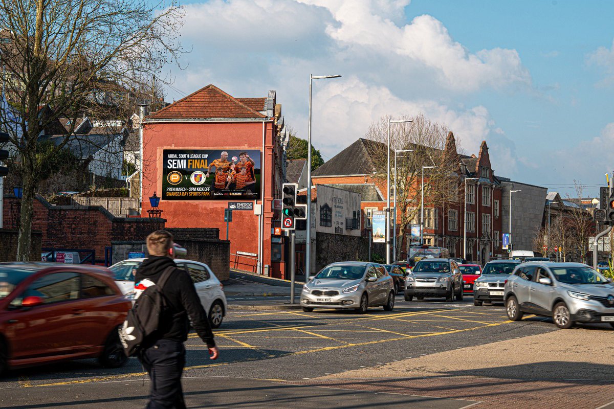 PureSwanseaFC's tweet photo. Big moment for the club! 🔥

Our Semi-Final is officially lighting up the city — featured on Emerge Advertising digital billboards right here in Swansea! 🙌

We hope to see you all show your support this Saturday at Swansea Bay Sports Park! 🧡 

#PureSwanseaFC#SwanseaFootball https://t.co/3mcis3qR6f