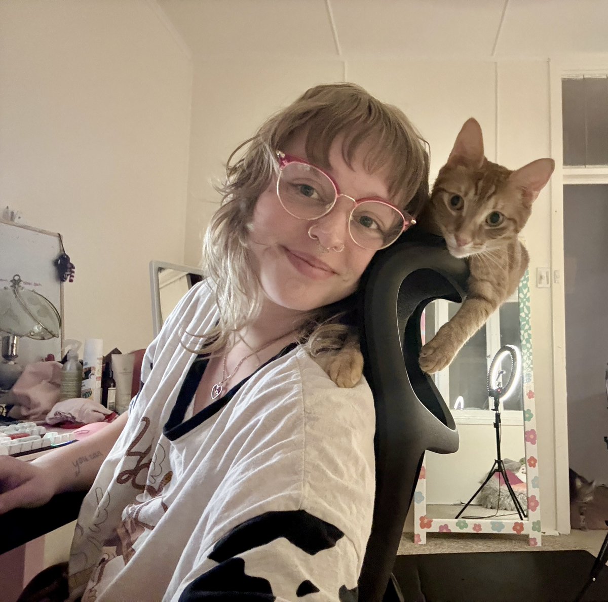 SoftBambie_'s tweet photo. Looking dorky in Pjs, pimple patches & a messy room but I can’t keep this picture to myself he’s too sweet to not share 🥹😭🥰#gingercat #orangecatbehaviour https://t.co/hgpDO9N83W
