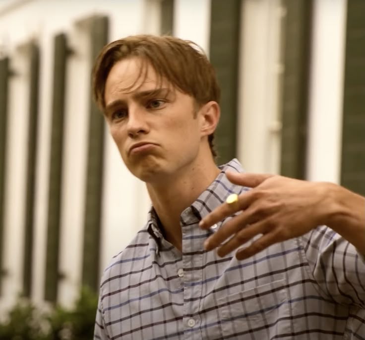 pouty mouth greasy bangs ring on his finger oooh can he stop flirting with me