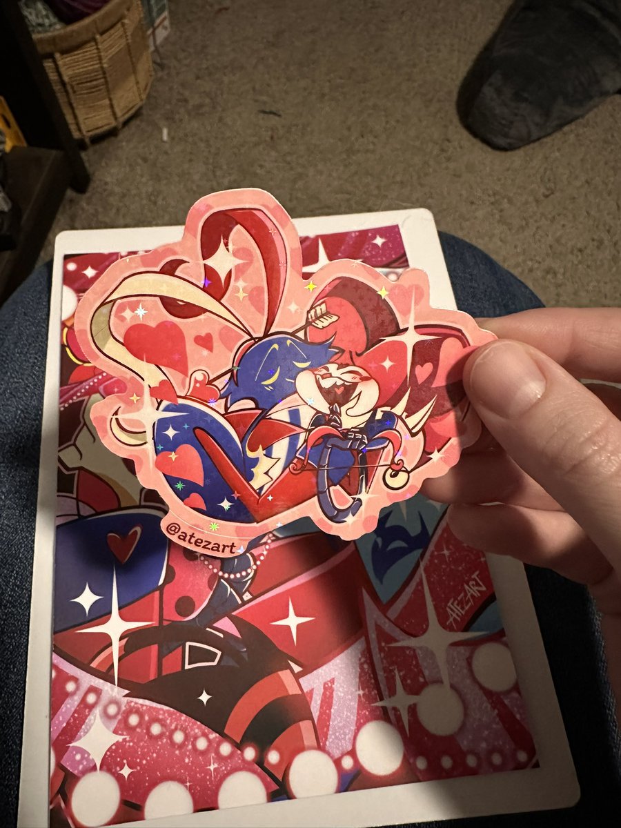 VioletShadowbne's tweet photo. Got this absolutely adorable Valentine’s Day print from @atezart (they are more active on Instagram, same name) in today, they are just to precious for words 💙💙🫶🫶😍😍 and the sticker is adorable 
#HelluvaBoss
#Fizzarozzie https://t.co/vU20y0IdSy