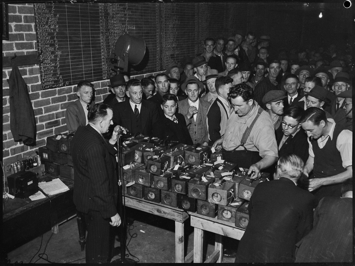 Geoffmuse's tweet photo. Pigeon racers with clocks, Australia, Taken October 1945, by Alec Iverson, from vintage negative. Uploaded to Wikipedia by @StateLibraryNSW https://t.co/gvCOQWIkF3 https://t.co/StmlKzQySw