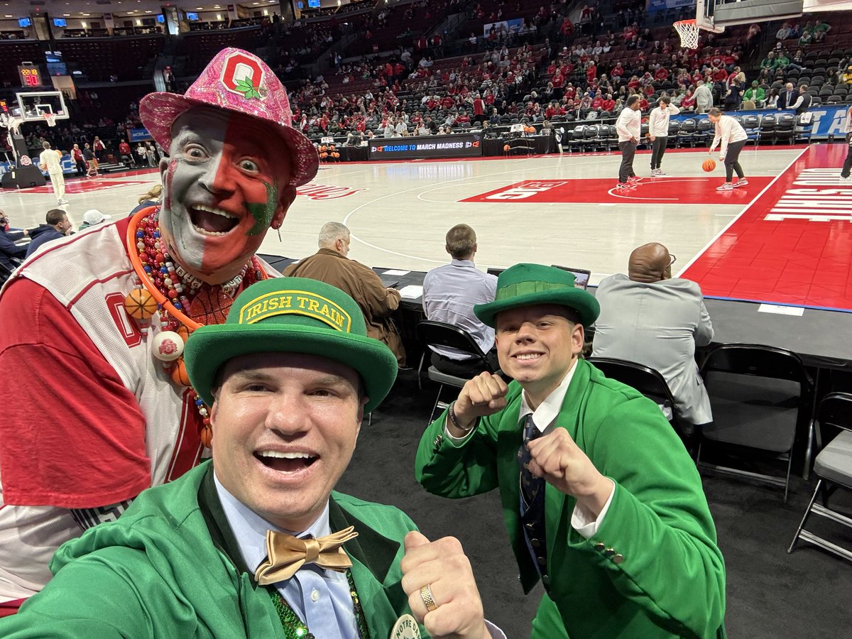 TheIrishTrain's tweet photo. The cheerleaders came over and got a photo with the Irish Train! Love my Irish family! I didn’t have the grades to go to Notre Dame but that doesn’t mean you have to be left out of the story🍀. Grateful for this University! Irish advance to Suite 16! #marcadness #irishtrain #notredame @FightingIrish @NDCheerTeam @RedditCFB