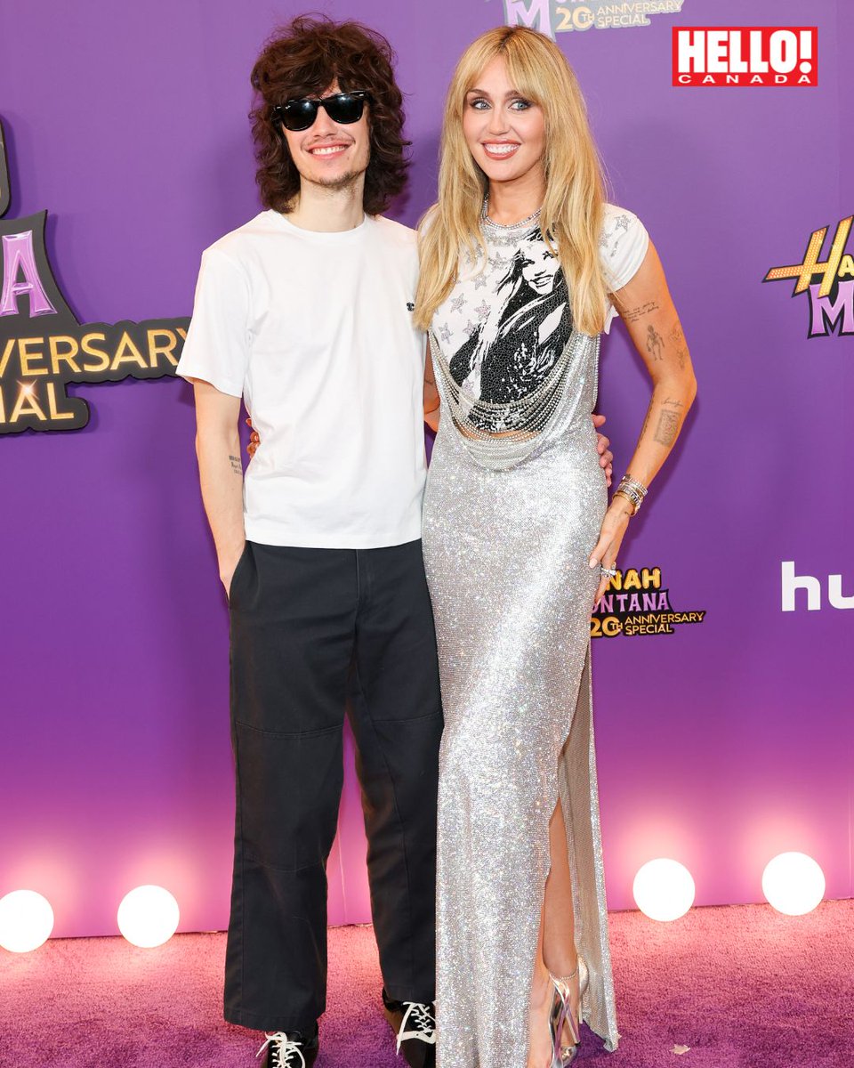 HelloCanada's tweet photo. Miley Cyrus had more than nostalgia to celebrate at the world premiere of Disney+’s Hannah Montana 20th Anniversary Special in L.A. 💫 The "Flowers" singer, 33, lit up the carpet as she showed her love for fiancé Maxx Morando – as well as her gold-and-diamond engagement ring 💍 

From teen idol to head-over-heels bride-to-be… we're loving this era for her 🥹✨

#mileycyrus #hannahmontana 

📸: Getty