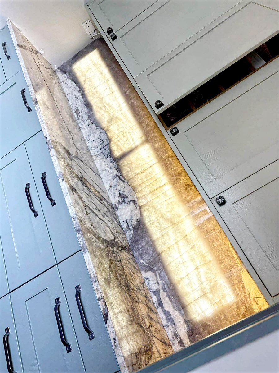 MarbleGDesigns's tweet photo. For this project, we didn't just stop at the worktops; we extended the Patagonia Crystal up as wall cladding and across the window sill. Matching those wild, chaotic veins across different planes requires exact templating and a lot of patience. Worth it. https://t.co/MdC6XDys1m
