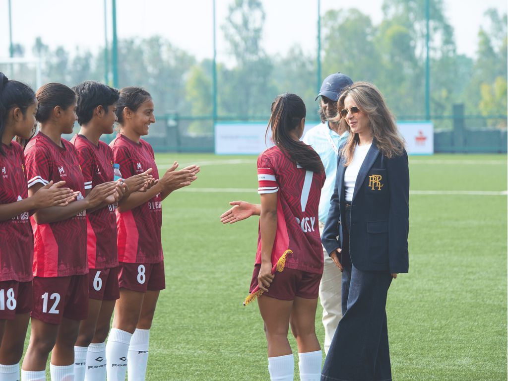roots_football's tweet photo. Reflecting a shared vision to grow the game beyond the pitch 🤝

Shruti Kashyap Choudhari, Director – Projects &amp; Strategy at B.L. Kashyap, greeted both Roots FC and DFA Raisen FC before their game on Matchday 1. 

#RootsFC #RootsWomen #IWL2 #BLKashyap #ShePlaysForRoots https://t.co/Yx5YnHJ6Tg