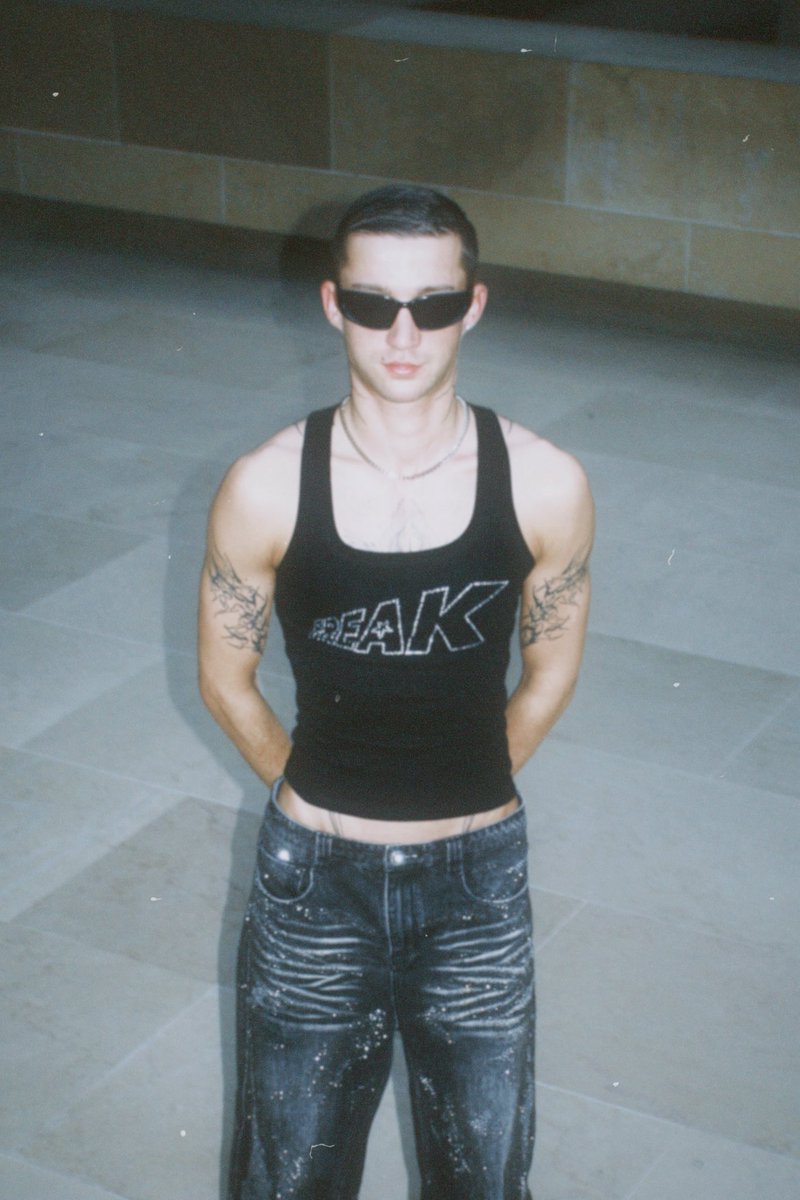 wearfreak's tweet photo. @iamapophis wearing our Crystal Freak Tank Top available for worldwide shipping 🩶 https://t.co/B5lT0Xt5H0