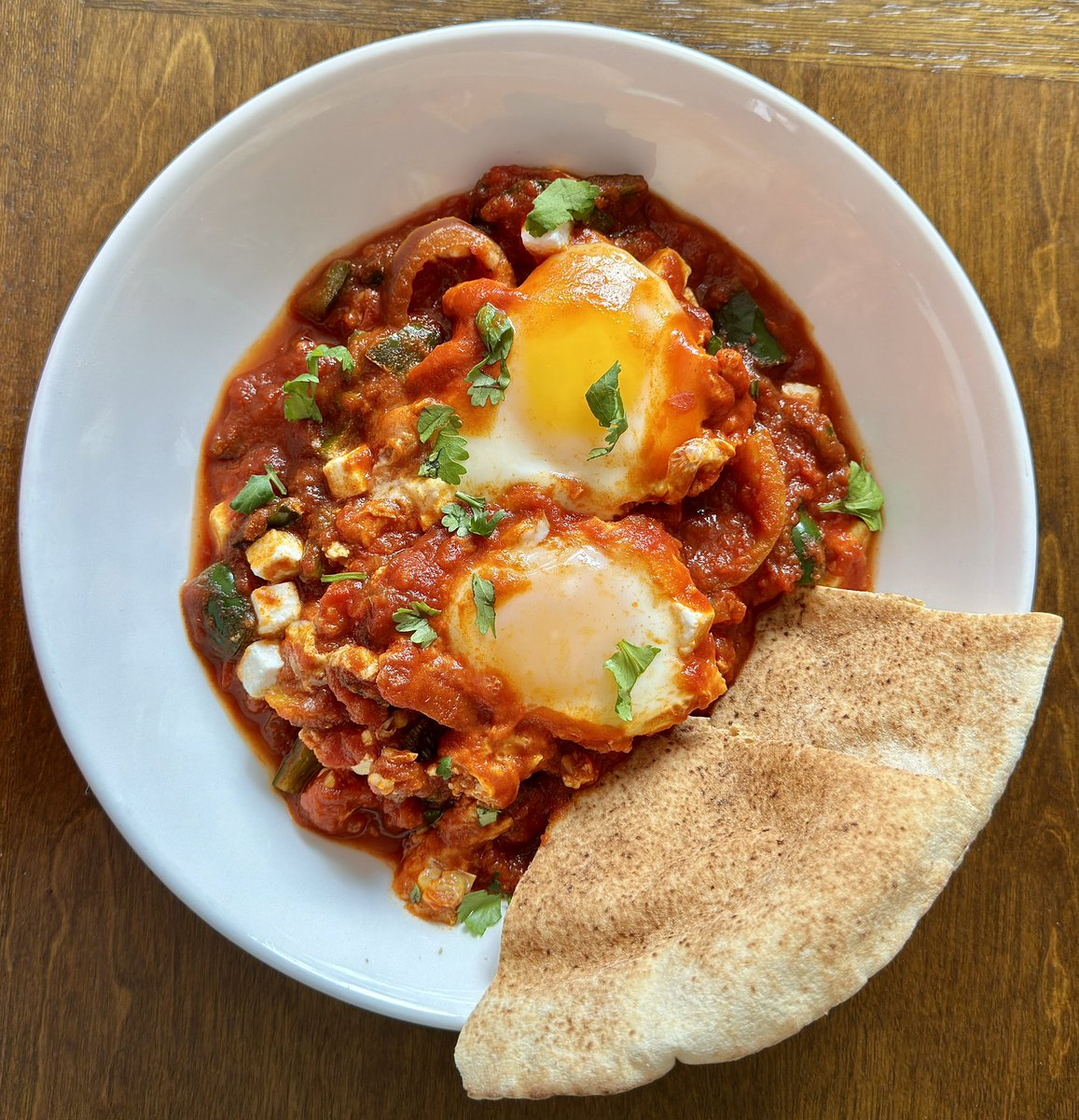 SamsHereForFood's tweet image. Shakshuka! With poblano peppers and feta. 😋 One of my favourite egg dishes. 
#tuesday #foodie #brunch #shakshuka