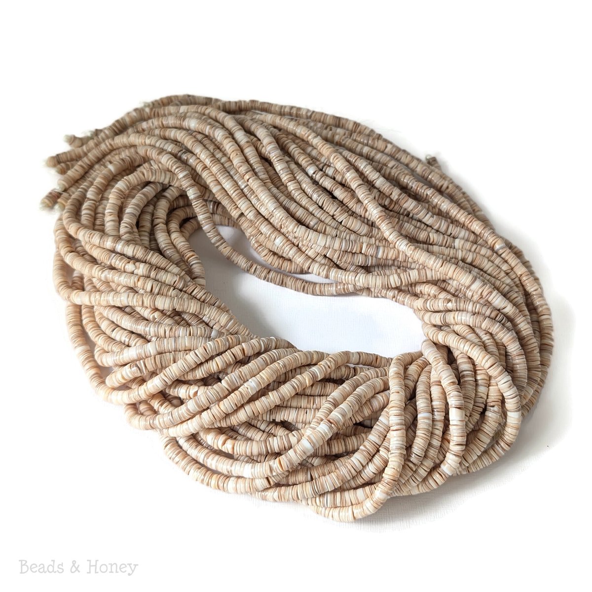 BeadsandHoney's tweet photo. 🐚Voluta #shell #heishi are a classic neutral to keep in your bead stash!✨ These are artisan handmade natural shell #beads. 24-inch strands are in stock now! 🛒 Beautiful designs start with beautiful beads. Find them today at https://t.co/HsOZl98rZZ. #beadsforsale #shellbeads https://t.co/yvdlhM2btn