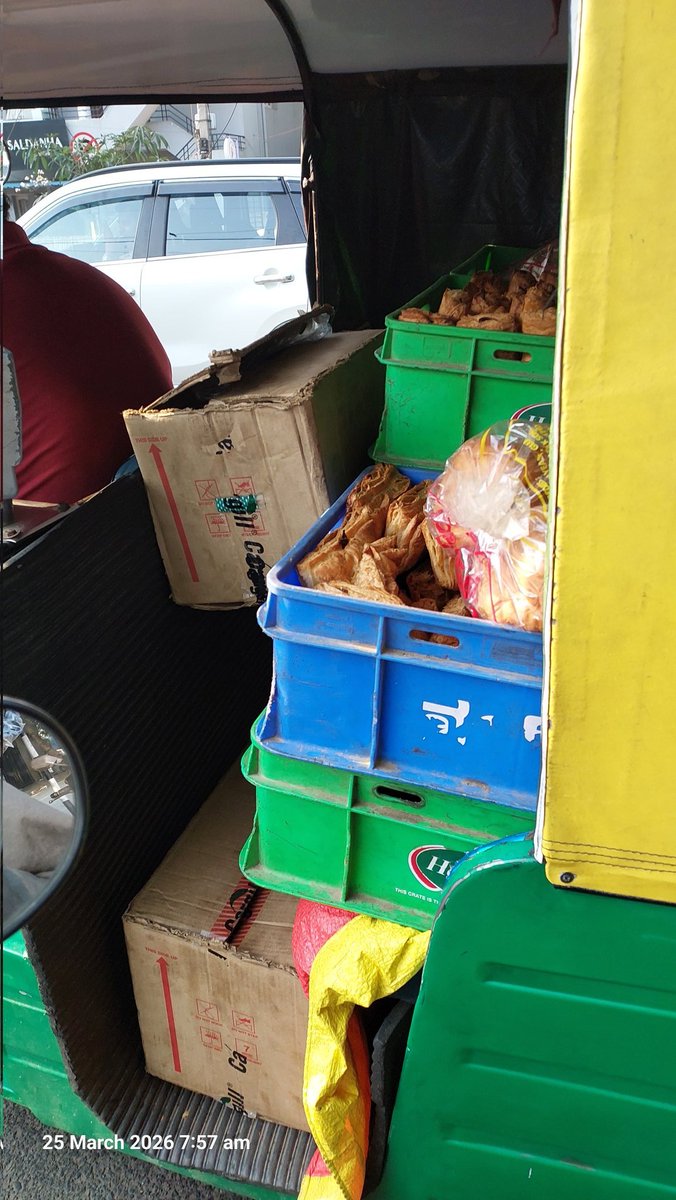 Seen at Bengaluru JP Nagar ring road. Bakery items being transported, exposed to all pollution and dust