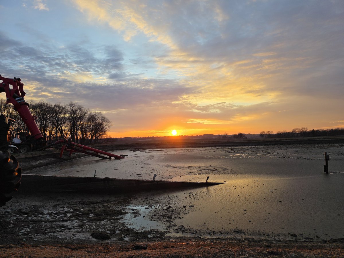 Started the morning checking on the.still burning from last night CRP prescribed burn and ended the daylight hours enjoying a beautiful sunset next to the lagoon while checking in again with the manure dragging pumping crew. It's been a day.