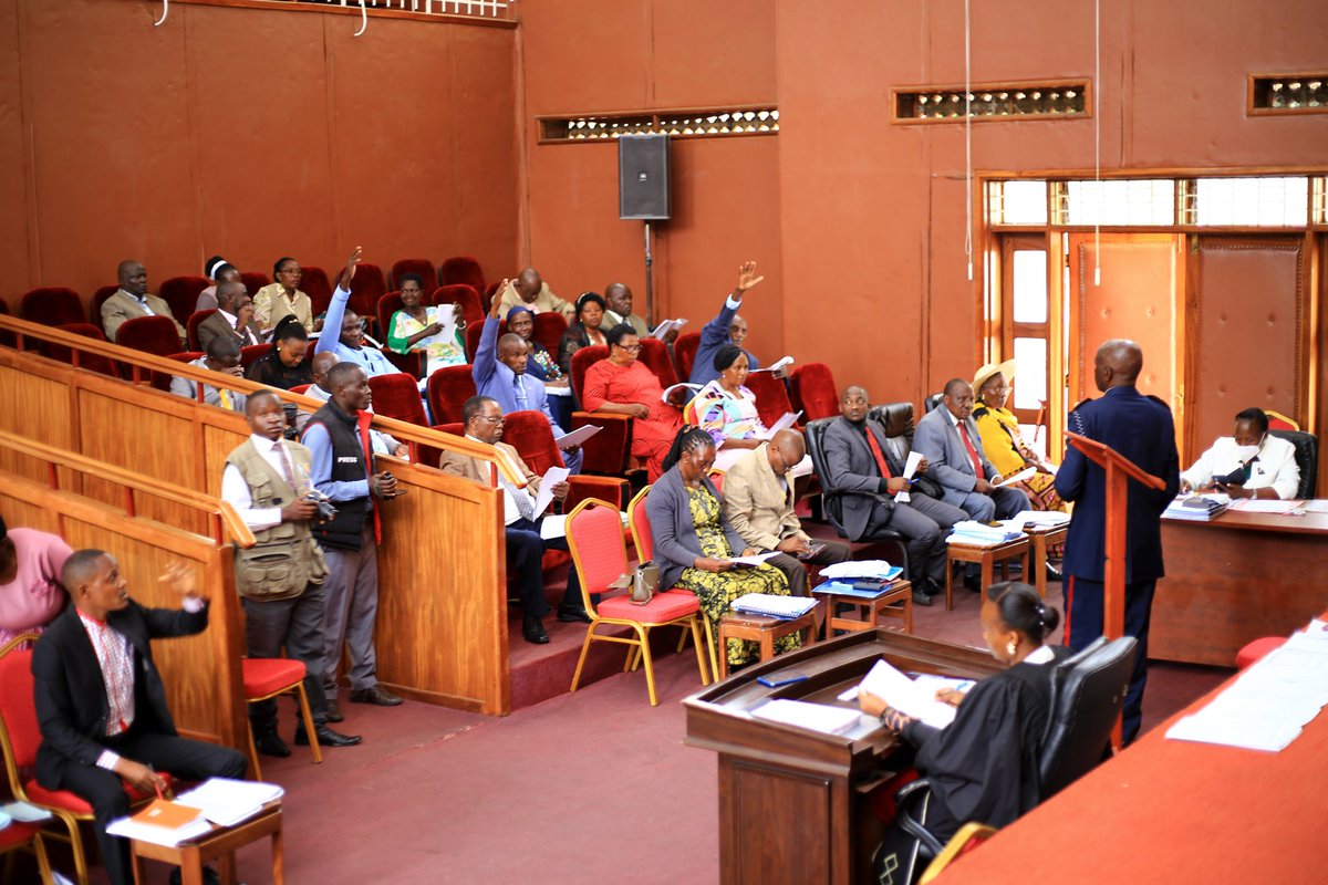 inahamya's tweet photo. *BUSHENYI DISTRICT COUNCIL PREMATURELY ADJOURNED OVER DISTRICT SERVICE COMMISSION APPROVAL

25/3/2026 

Douglas Mucunguzi, the Bushenyi District Speaker yesterday 24.march 2026, adjourned the district council till further notice. This came about when councilors protested the procedural matter put before them which was laying of budget framework for 2026-2031.

Councilors asked to be explained to why the names  of people they passed to be on the District service commission haven't been approved by Public service Commission yet the timeframe for the approval process has elapsed.

Jaffari Bassajabalaba, the outgoing Chairman Lc v explained that he submitted the necessary documentation, however officials came to district last week to query the corruption and bribery related matter sorrounding this whole matter.

He says that they are likely to release a report with detailed findings which will guide the council on way forward.

Mr kakonge Apollo Lee Executive Director western Ankole Civil Society Forum says that he interested himself in this matter after a leaked audio of the suggested district service commission one barahuka Denning promising the blocker to pay balance of the bribe to the District Chairperson Mr Jaffari Bassajabalaba so that his name can be approved. Kakonge says this prompted him to write to relevant authorities to come and intervene, if possible arrest and put in courts of law the parties involved. "We can't keep on living in such an environment where the person being appointed to head the commission to recruit district workers is buying his way there, do you expect this person to preside over recruitments freely and fairly " he added.

He concluded by guiding the council to convene as soon as possible and do laying of budget framework because a government can't operate without a budget. He said that people vote these councillors to come and represent them not to joke around. 

It should be remembered that all this started a few months ago when an audio having a conversation of one Barahuka Denning whose name was approved by the district Council leaked to public where he was heard admitting to have paid certain amount of money to become approved the incoming chairman Bushenyi District service commission. It has since then created divergent discussions until today when the matter remains hanging with no one knowing when what will happen.

The district council is in it's final days and therefore  has limited time to do things right like budgeting process and others or be counted as a failed ruling tenure.

END

@WACSOF @MoLGUganda @venusonlineug @AntiGraft_SH @ngoforum @SarahBireete