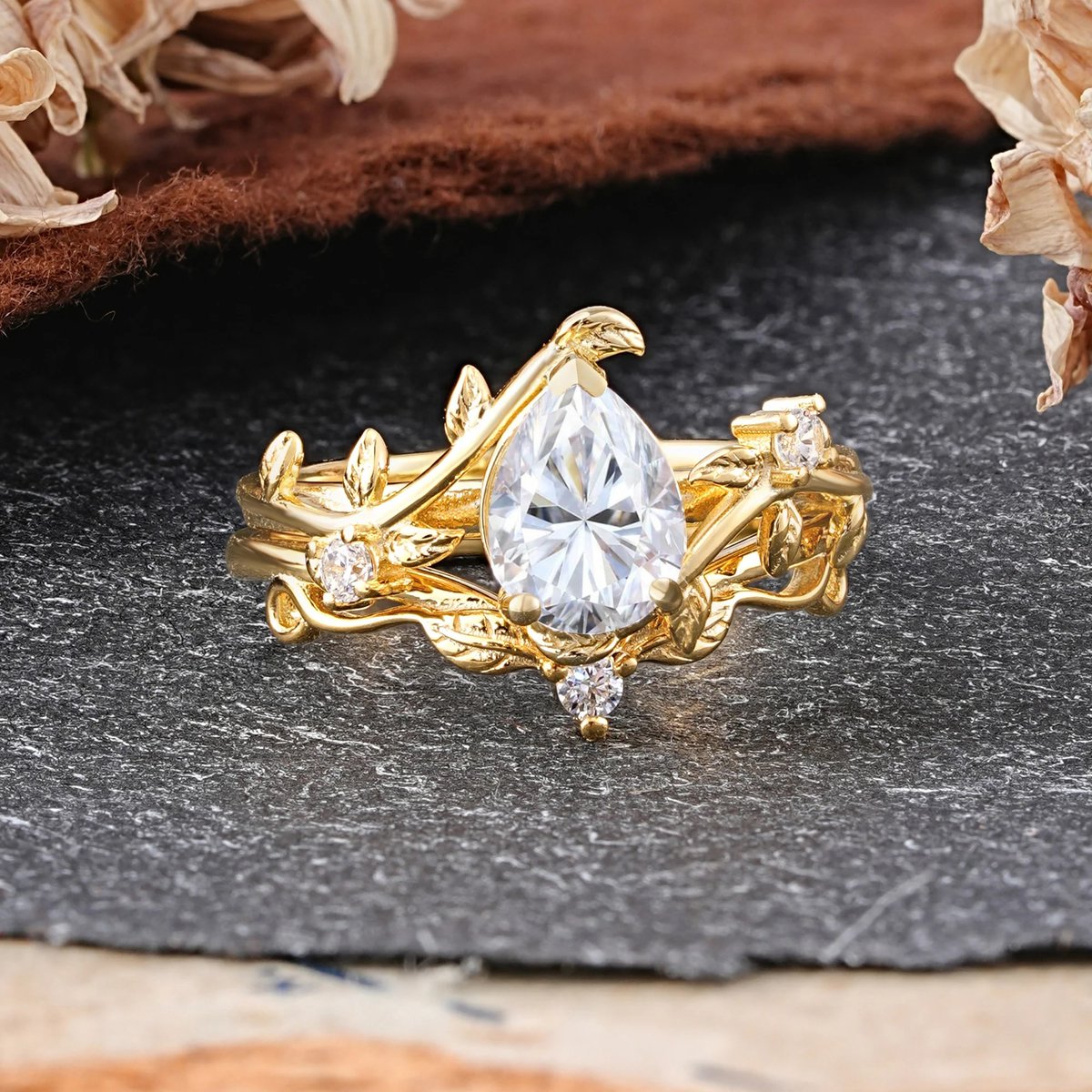 Romalarjewelry's tweet photo. A masterclass in stacking. 💅✨ This 3-Prong Pear Moissanite ensemble is the ultimate cool-girl flex. #RingStacking #PearRing #StackableRings #Moissanite #ROMALAR https://t.co/cR6e494HKR