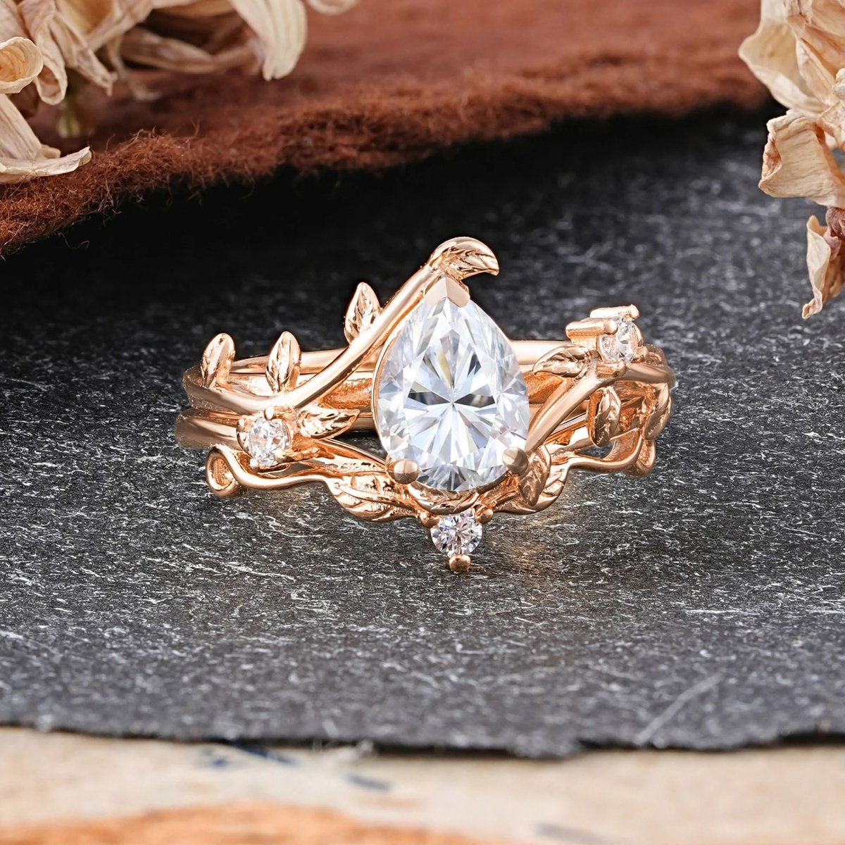 Romalarjewelry's tweet photo. A masterclass in stacking. 💅✨ This 3-Prong Pear Moissanite ensemble is the ultimate cool-girl flex. #RingStacking #PearRing #StackableRings #Moissanite #ROMALAR https://t.co/cR6e494HKR