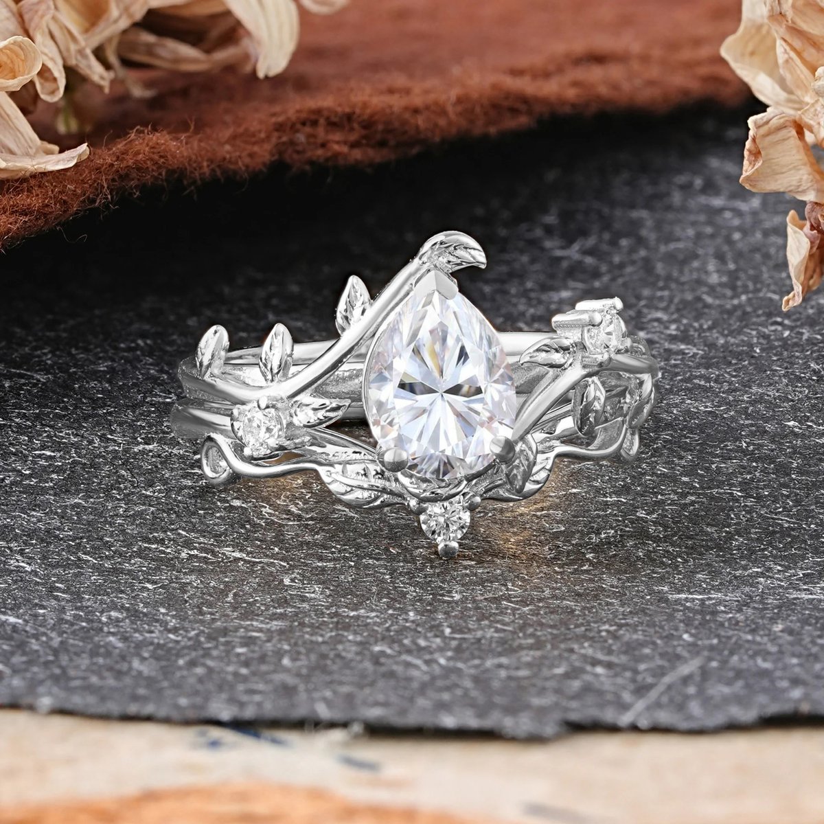 Romalarjewelry's tweet photo. A masterclass in stacking. 💅✨ This 3-Prong Pear Moissanite ensemble is the ultimate cool-girl flex. #RingStacking #PearRing #StackableRings #Moissanite #ROMALAR https://t.co/cR6e494HKR