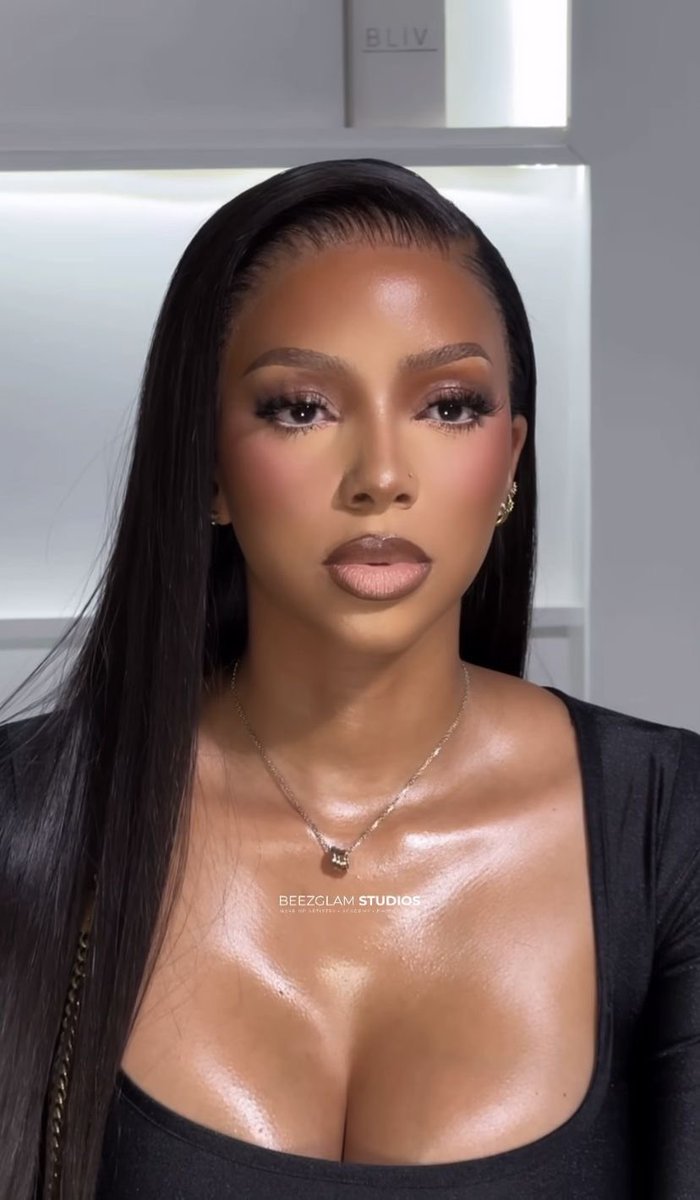 Does she look better

Without makeup              Or                With makeup